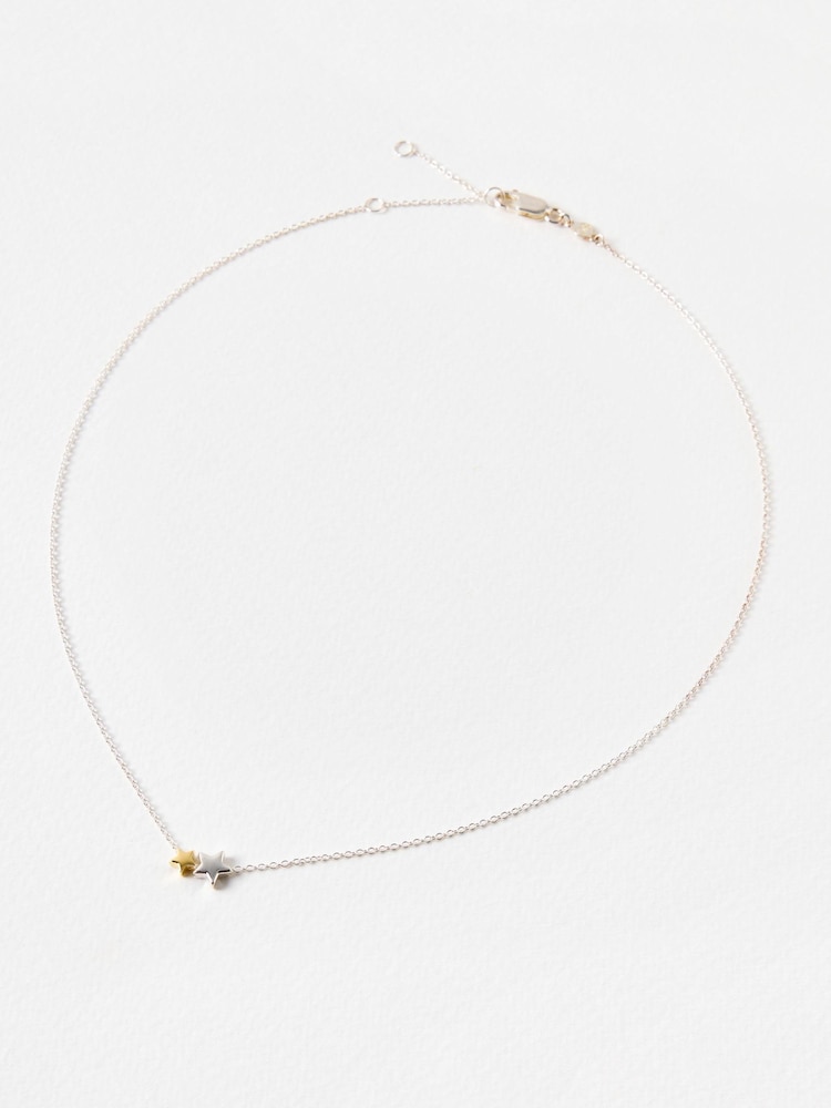 Oliver Bonas Silver & Gold Tone Callie Star Charm Pendant Necklace - Image 1 of 4 Oliver Bonas Silver & Gold Tone Callie Star Charm Pendant Necklace - Image 1 of 4