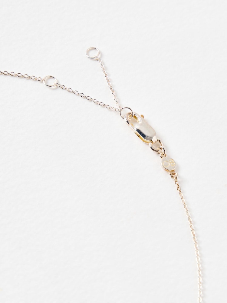 Oliver Bonas Silver & Gold Tone Callie Star Charm Pendant Necklace - Image 2 of 4 Oliver Bonas Silver & Gold Tone Callie Star Charm Pendant Necklace - Image 2 of 4