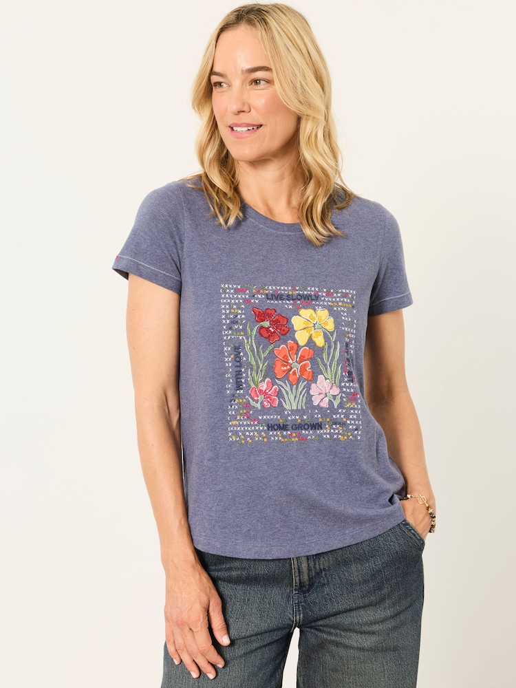 FatFace Denim Blue Floral Cross Stitch Graphic T-Shirt - Image 1 of 6 FatFace Denim Blue Floral Cross Stitch Graphic T-Shirt - Image 1 of 6
