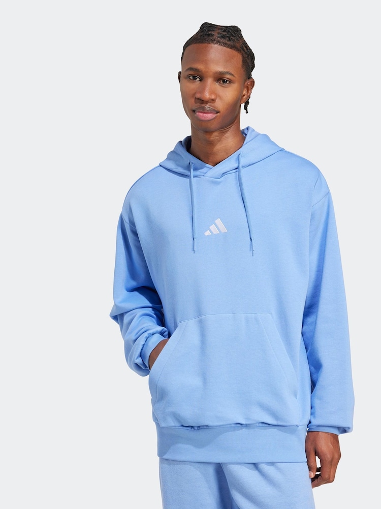 adidas Blue Dark Essentials Feelcozy Fleece Hoodie - Image 1 of 7 adidas Blue Dark Essentials Feelcozy Fleece Hoodie - Image 1 of 7