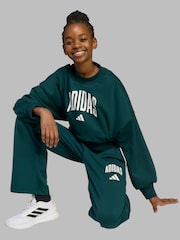 أخضر - بنطلونات رياضية للأطفال من تشكيلة Essentials Collegiate من adidas - صورة 3 من 7
