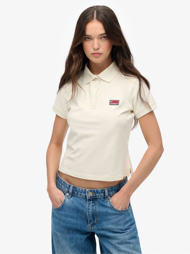 Superdry Cream Ath Essential Graphic Print Polo Shirt - Image 1 of 6 Superdry Cream Ath Essential Graphic Print Polo Shirt - Image 1 of 6