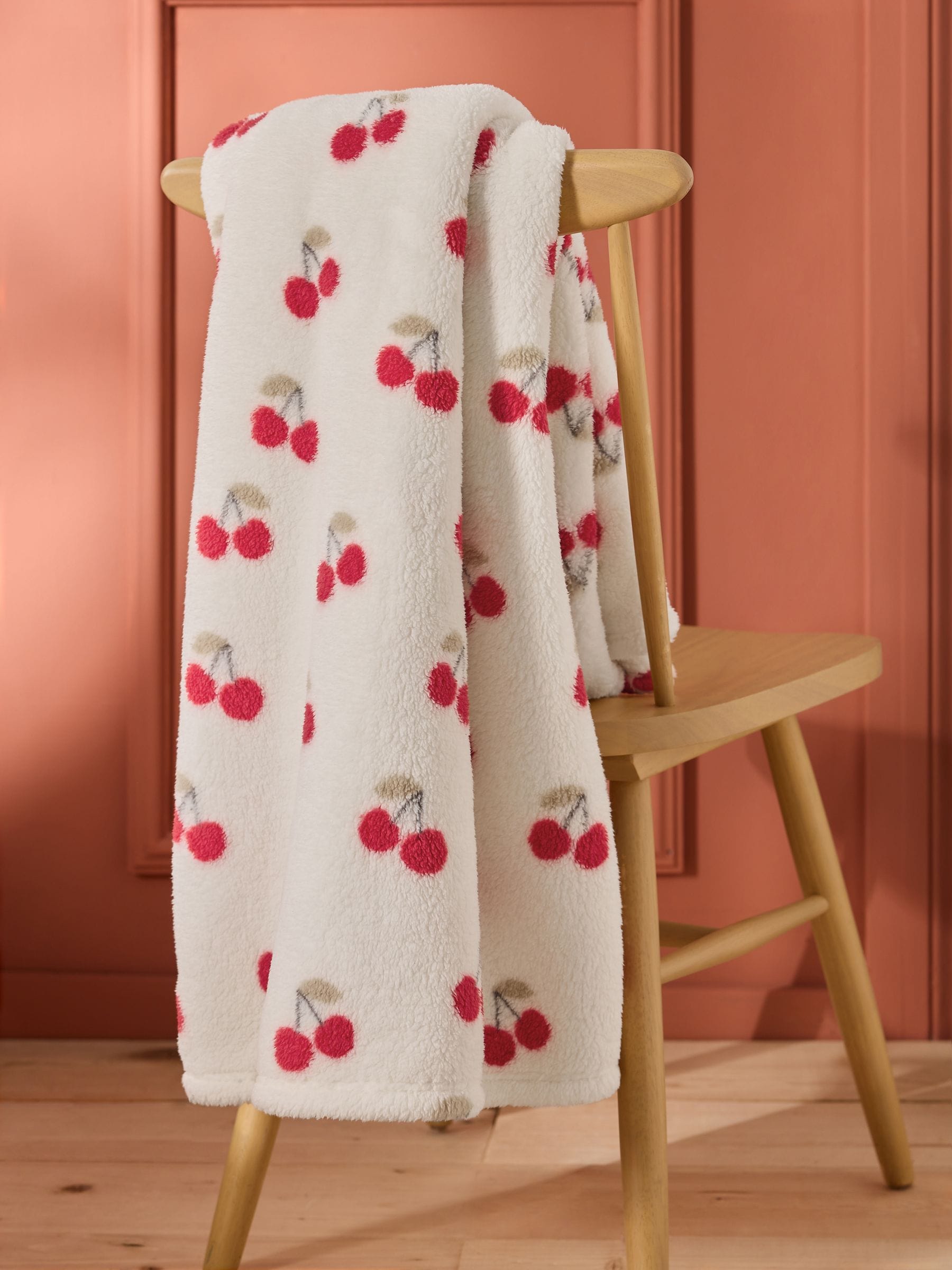 Buy Cream Cherry Fleece Throw from Next USA