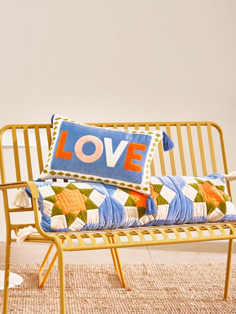Oliver Bonas Blue Patchwork Quilted Bolster Cushion - Image 1 of 6
