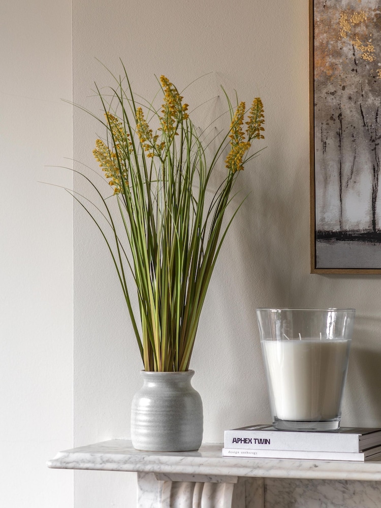 Gallery Home White Faux Potted Grass with Yellow Wildflower - Image 1 of 6