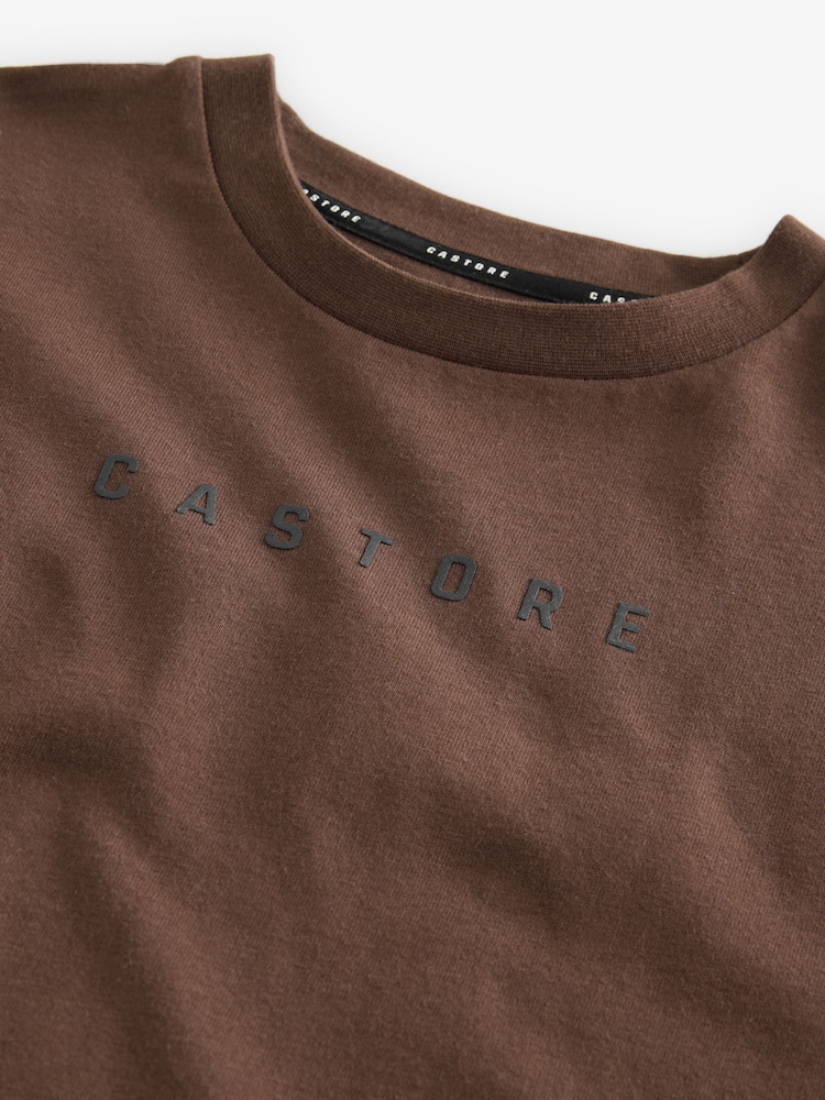 بني - تيشرت قطن بأكمام قصيرة وفضفاض من Castore - صورة 9 من 9 بني - تيشرت قطن بأكمام قصيرة وفضفاض من Castore - صورة 9 من 9