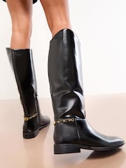 Lipsy Black Glossy Patent Knee High Low Block Heel Riding Boots with Gold Stirrup Chain Detail - Image 2 of 5