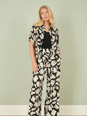 Yumi Black Relaxed Fit 100% Cotton Splash Print Trousers - Image 3 of 5