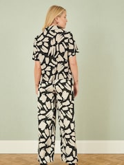 Yumi Black Relaxed Fit 100% Cotton Splash Print Trousers - Image 4 of 5