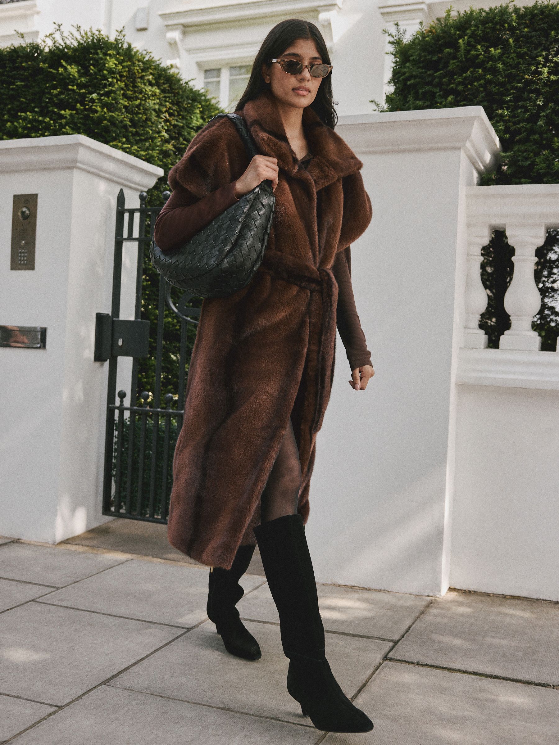 Buy Chocolate Brown Tie Waist Long Line Faux Fur Gilet from Next USA