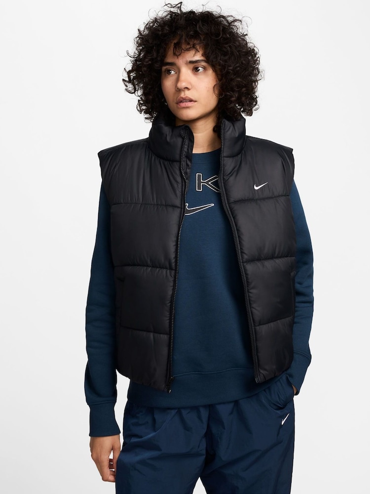 Nike Black Loose Sportswear Classic Puffer Therma-FIT Gilet - Image 1 of 7 Nike Black Loose Sportswear Classic Puffer Therma-FIT Gilet - Image 1 of 7