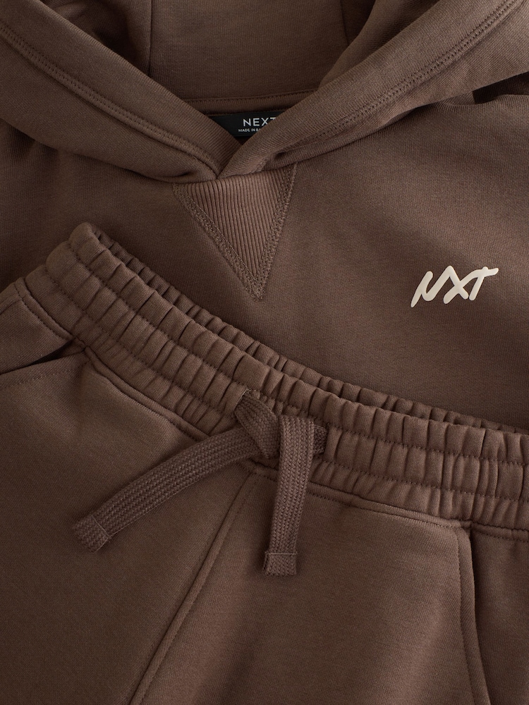 Sweat à capuche marron logo graphic , déperlant et anti-vent - CARHARTT