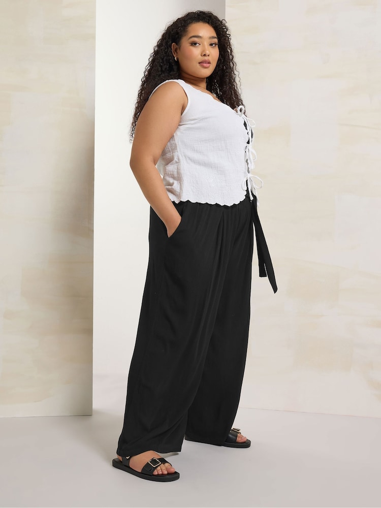 Yours Curve Black Crinkle Tie Waist Wide Leg Trousers - Image 2 of 5 Yours Curve Black Crinkle Tie Waist Wide Leg Trousers - Image 2 of 5