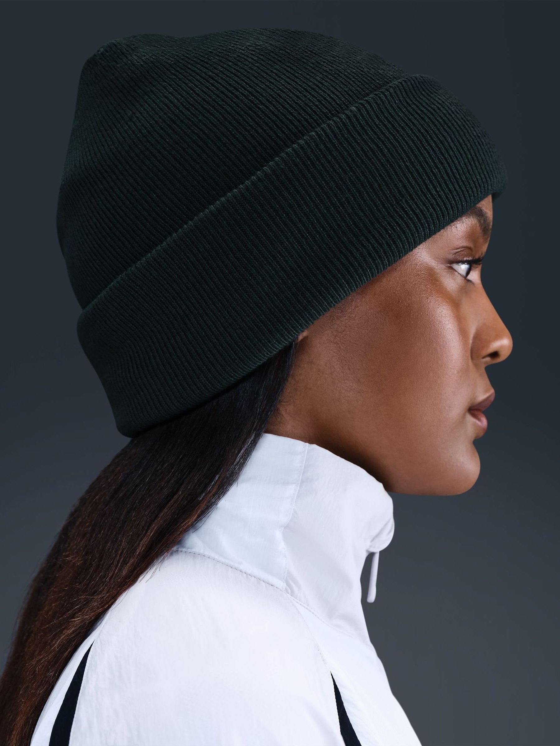 Buy Nike Green Peak Swoosh Logo Beanie from the Next UK online shop