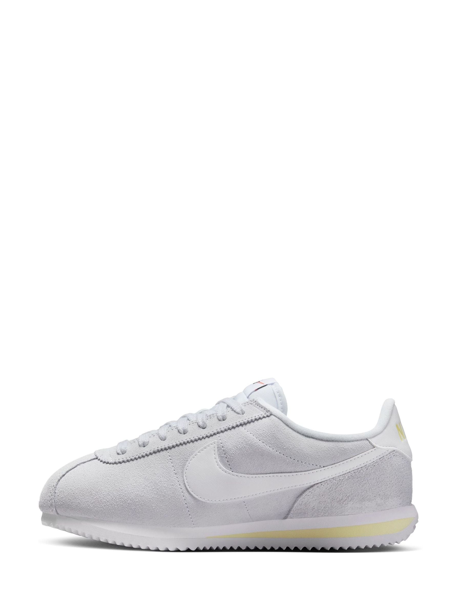 white cortez trainers