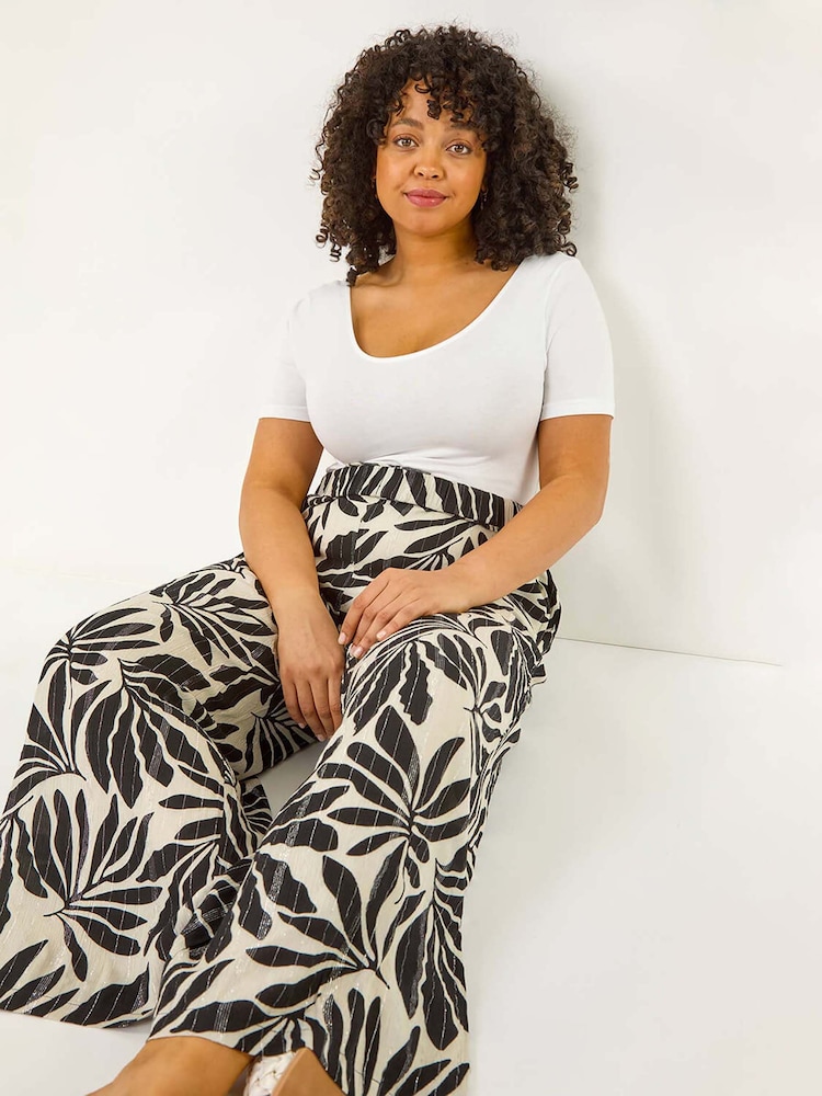 Roman Curve Leaf Print Metallic Wide Leg Trousers - Imagen 1 de 5 Roman Curve Leaf Print Metallic Wide Leg Trousers - Imagen 1 de 5