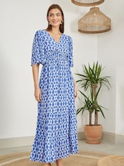 Vestido longo estampado Yumi com costas cruzadas - Imagem 1 de 5