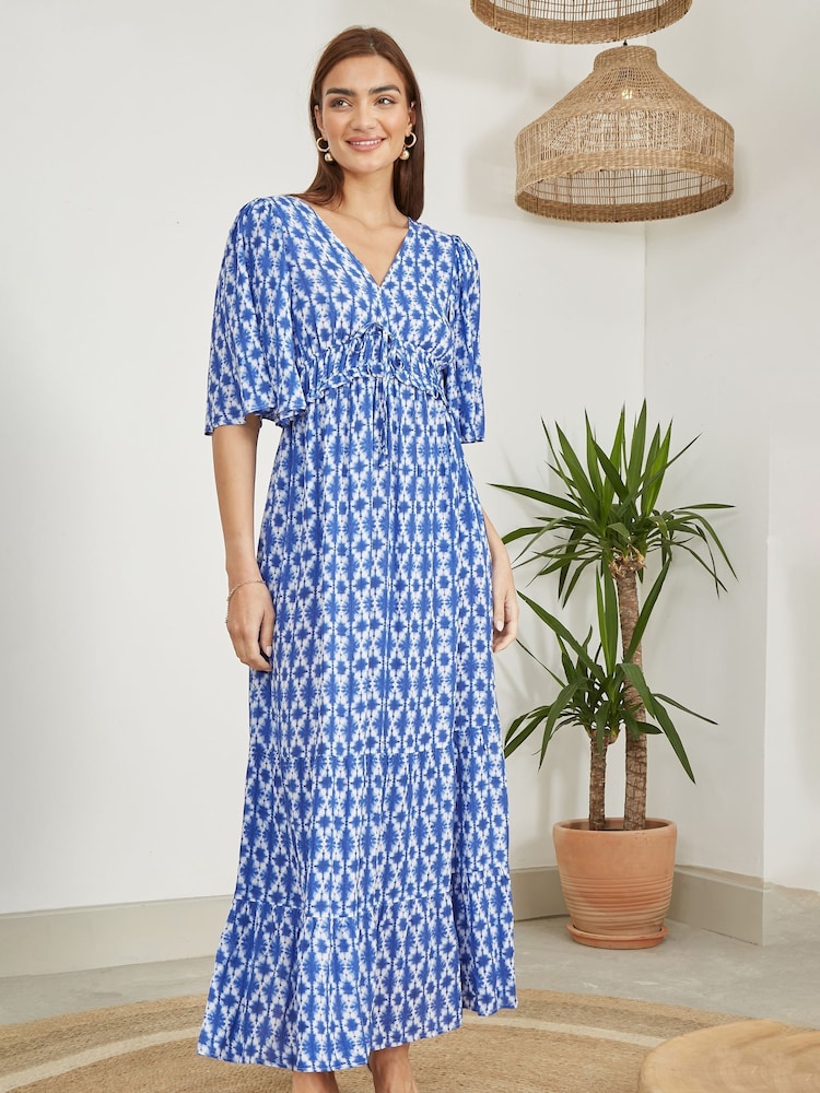 Vestido longo estampado Yumi com costas cruzadas - Imagem 1 de 5