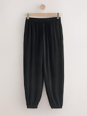 שחור - מכנסי טרנינג בגזרת שרוואל מבד ג'רזי - תמונה 6 מתוך 8