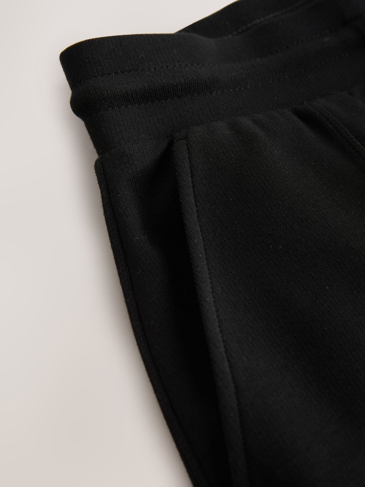NEXT Pantalon Jogging Coupe Large Homme/Femme – Essentiel Confort Tendance, Style Décontracté Quotidien