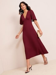 Friends Like These Burgundy Red Textured Jersey V-Neck Midi Dress - Image 1 of 4