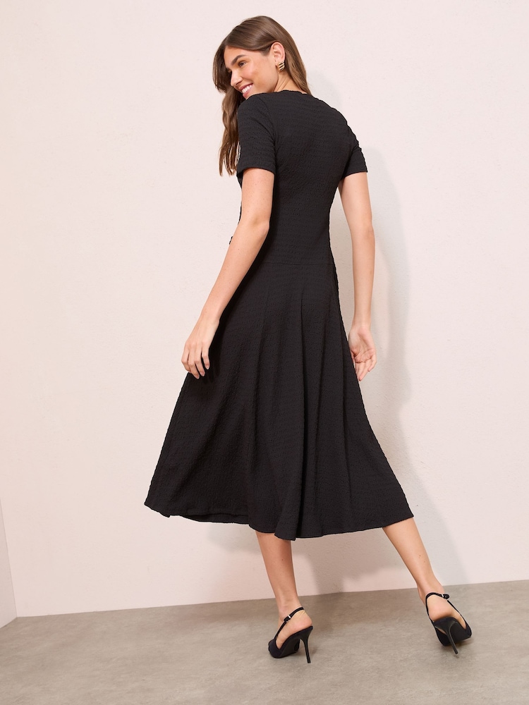 Friends Like These Black Textured Jersey Drop Waist Button Detail Midi Dress - Image 4 of 4 Friends Like These Black Textured Jersey Drop Waist Button Detail Midi Dress - Image 4 of 4