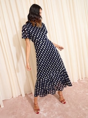 Friends Like These X Lucy Mecklenburgh Navy Petite Foil Spot Short Sleeve Chiffon Tiered Maxi Dress - Image 2 of 6