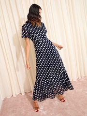 Friends Like These X Lucy Mecklenburgh Navy Petite Foil Spot Short Sleeve Chiffon Tiered Maxi Dress - Image 5 of 6