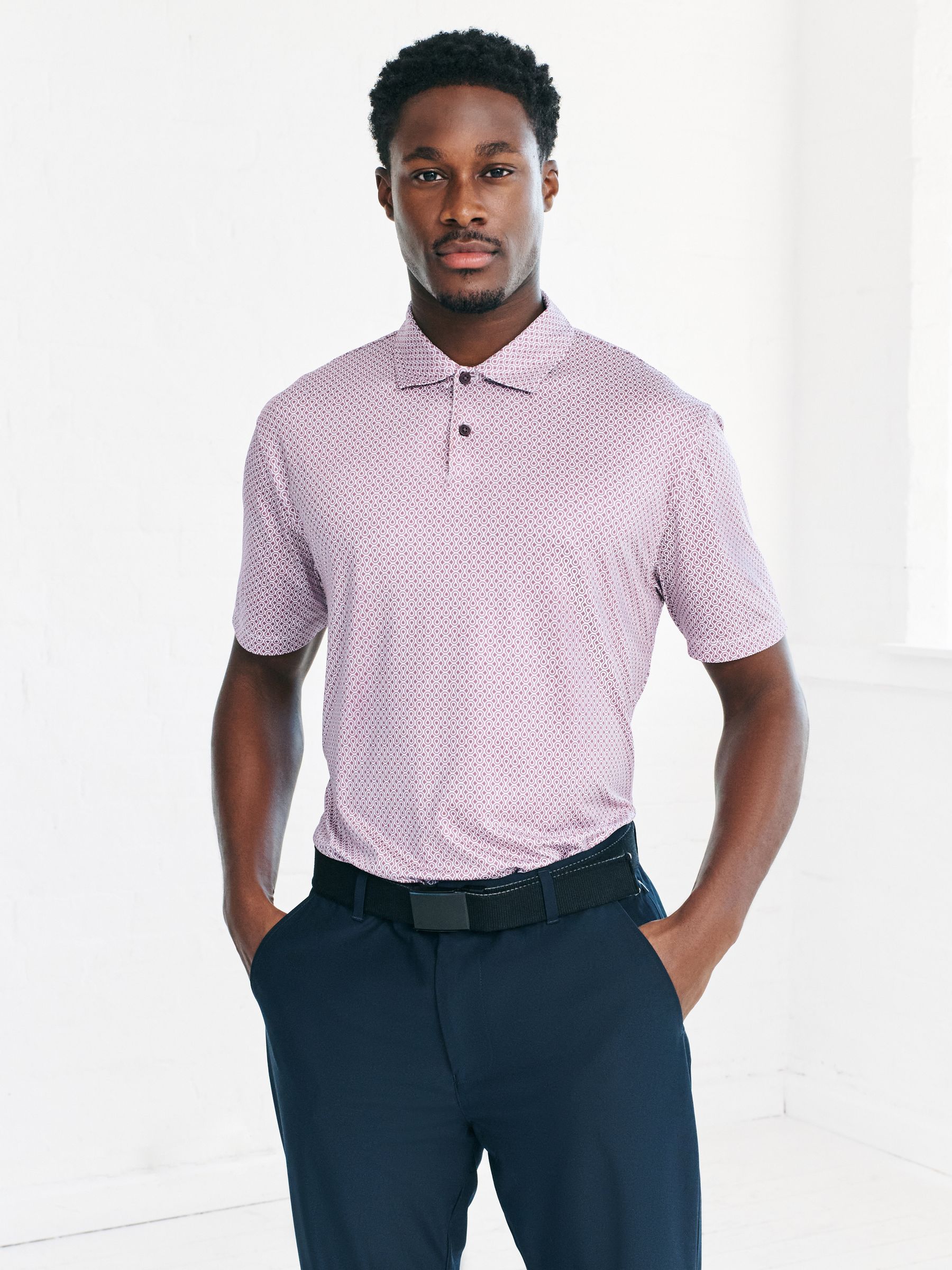 Buy Pink Active Geometric Print Golf Polo Shirt from Next Romania