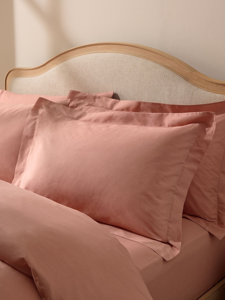 Set of 2 Peach Pink Cotton Rich Pillowcases - Image 2 of 3