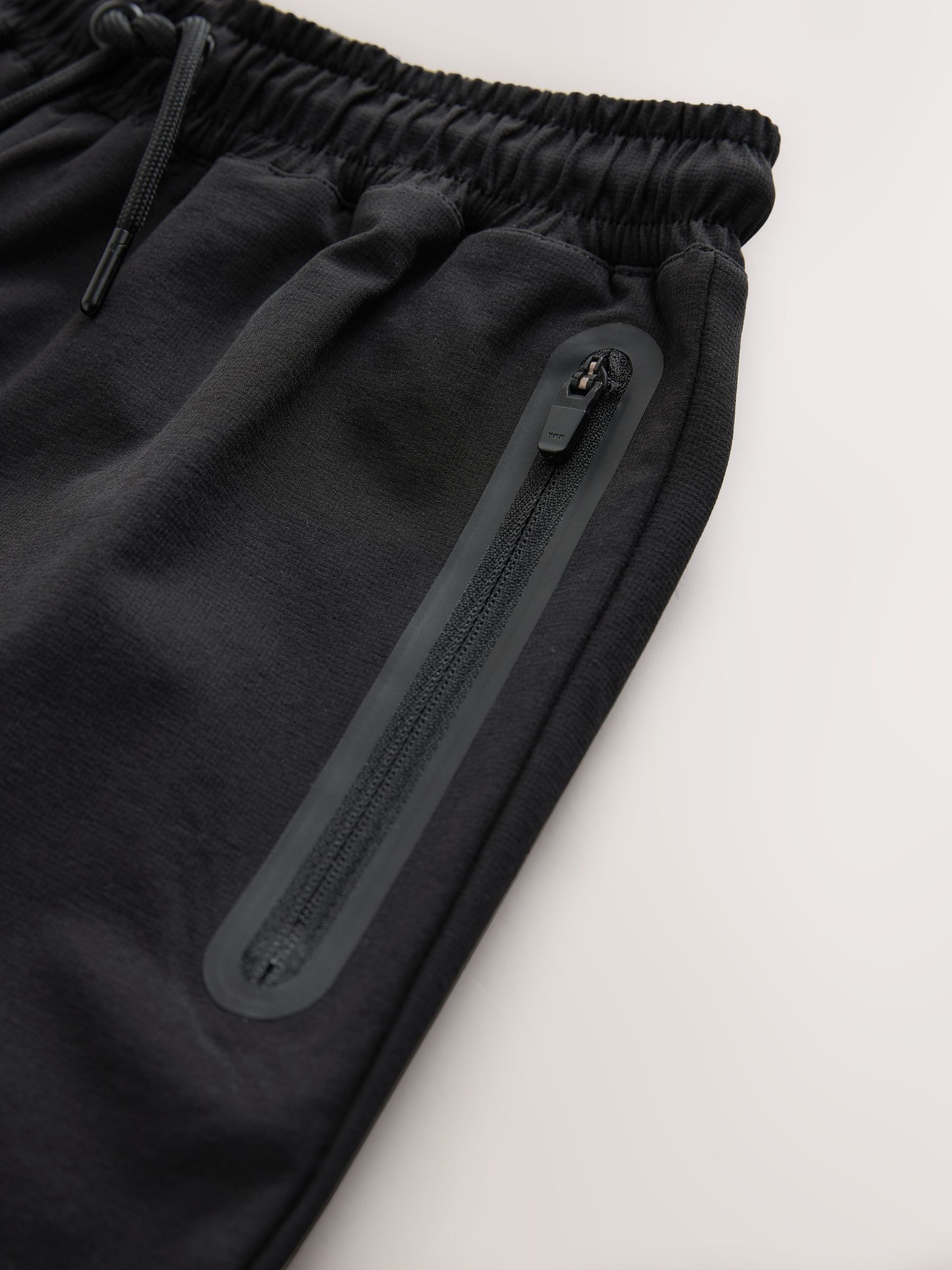Buy Black Wide Fit Pull On Track Joggers (3-16yrs) from Next USA