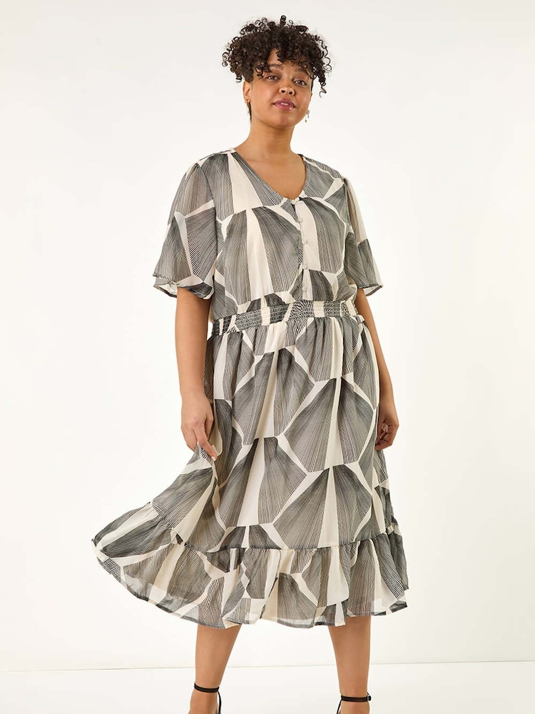 Roman Curve Abstract Button Detail Midi Dress - Imagen 2 de 5 Roman Curve Abstract Button Detail Midi Dress - Imagen 2 de 5