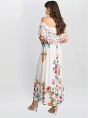 Vestido blanco de algodón 100 % con hombros descubiertos y volantes Rose de Gina Bacconi - Imagen 2 de 6
