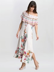 Vestido blanco de algodón 100 % con hombros descubiertos y volantes Rose de Gina Bacconi - Imagen 3 de 6