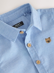 أزرق - قميص أكسفورد بكُم قصير برسمة شخصية (3شهور -7سنوات) - صورة 7 من 8