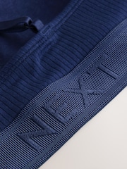 צבע לבן/ירוק/נייבי - מארז של 3 חזיות ברלט מבד ריב מסיב כותנה עם לוגו - תמונה 11 מתוך 11