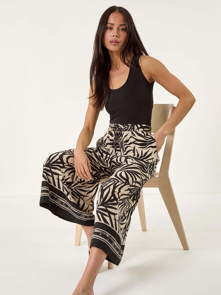 Roman Black Petite Leaf Border Print Tie Waist Culottes - Image 1 of 5