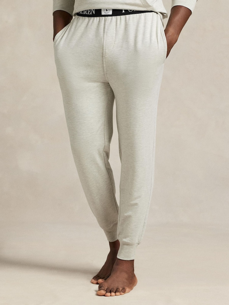 Polo Ralph Lauren Grey Taper Fit Logo Waistband Jersey Joggers - Image 1 of 3 Polo Ralph Lauren Grey Taper Fit Logo Waistband Jersey Joggers - Image 1 of 3