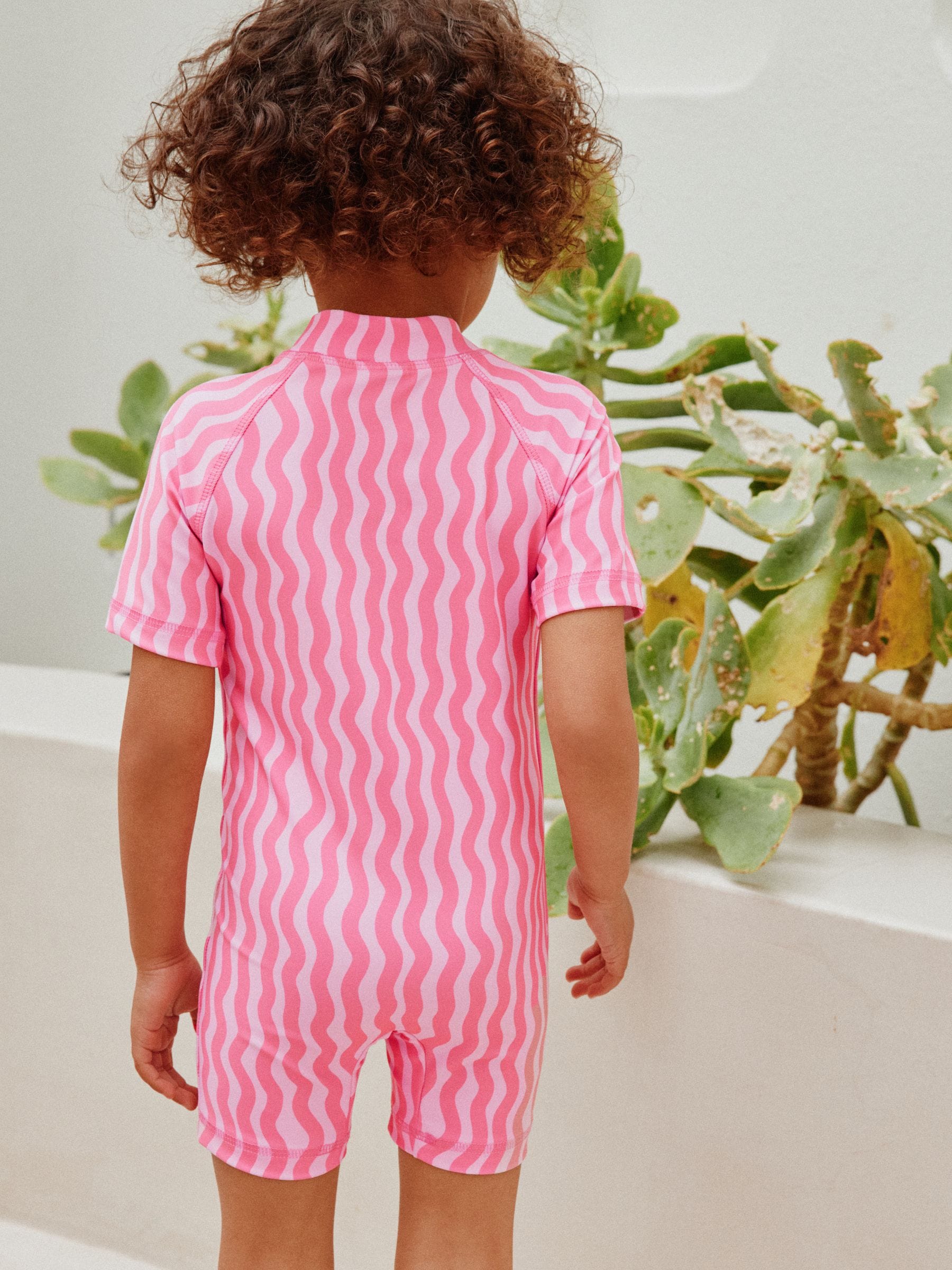 Buy Pink Cherry Wave Sunsafe Swimsuit (3mths-10yrs) from Next Austria