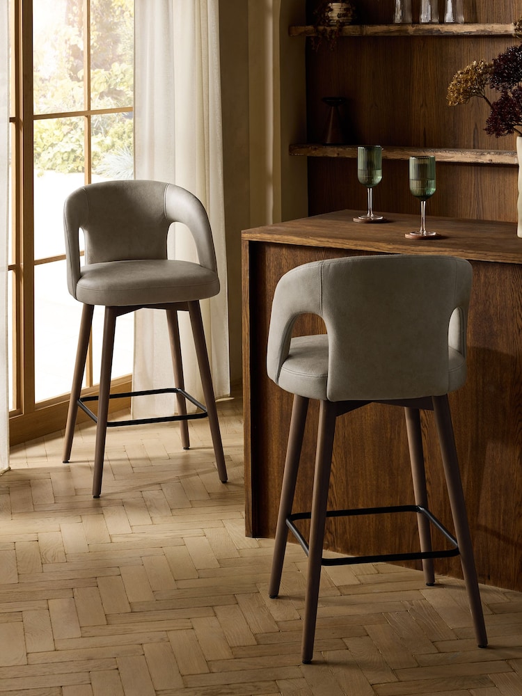 Easton Faux Leather Silver Grey Mid Wood Leg Orton Bar Stool - Image 1 of 10 Easton Faux Leather Silver Grey Mid Wood Leg Orton Bar Stool - Image 1 of 10