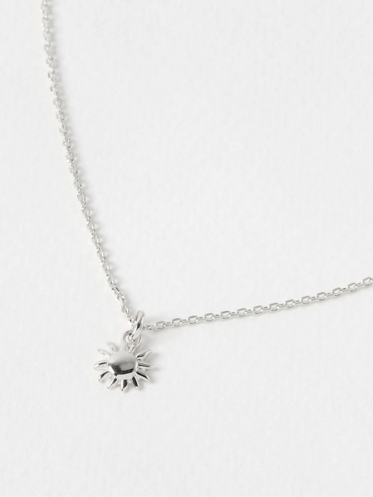 Oliver Bonas Silver Tone Elio Sun Charm Sterling Pendant Necklace - Image 1 of 4 Oliver Bonas Silver Tone Elio Sun Charm Sterling Pendant Necklace - Image 1 of 4