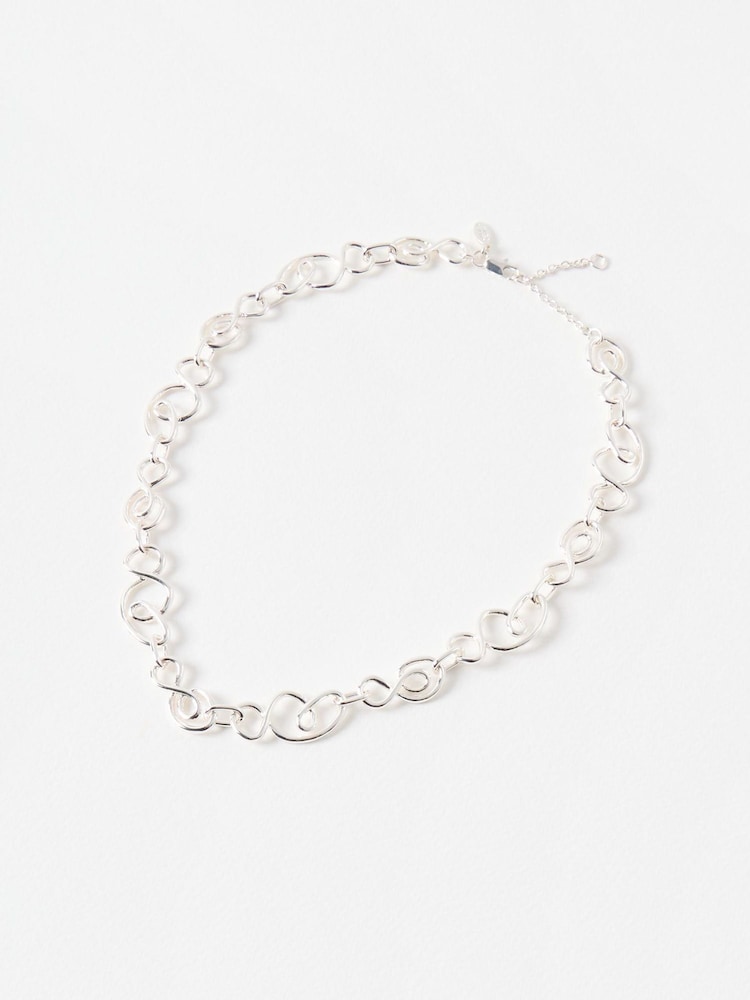 Oliver Bonas Silver Enza Abstract Links Coloured Collar Necklace - Image 1 of 4 Oliver Bonas Silver Enza Abstract Links Coloured Collar Necklace - Image 1 of 4