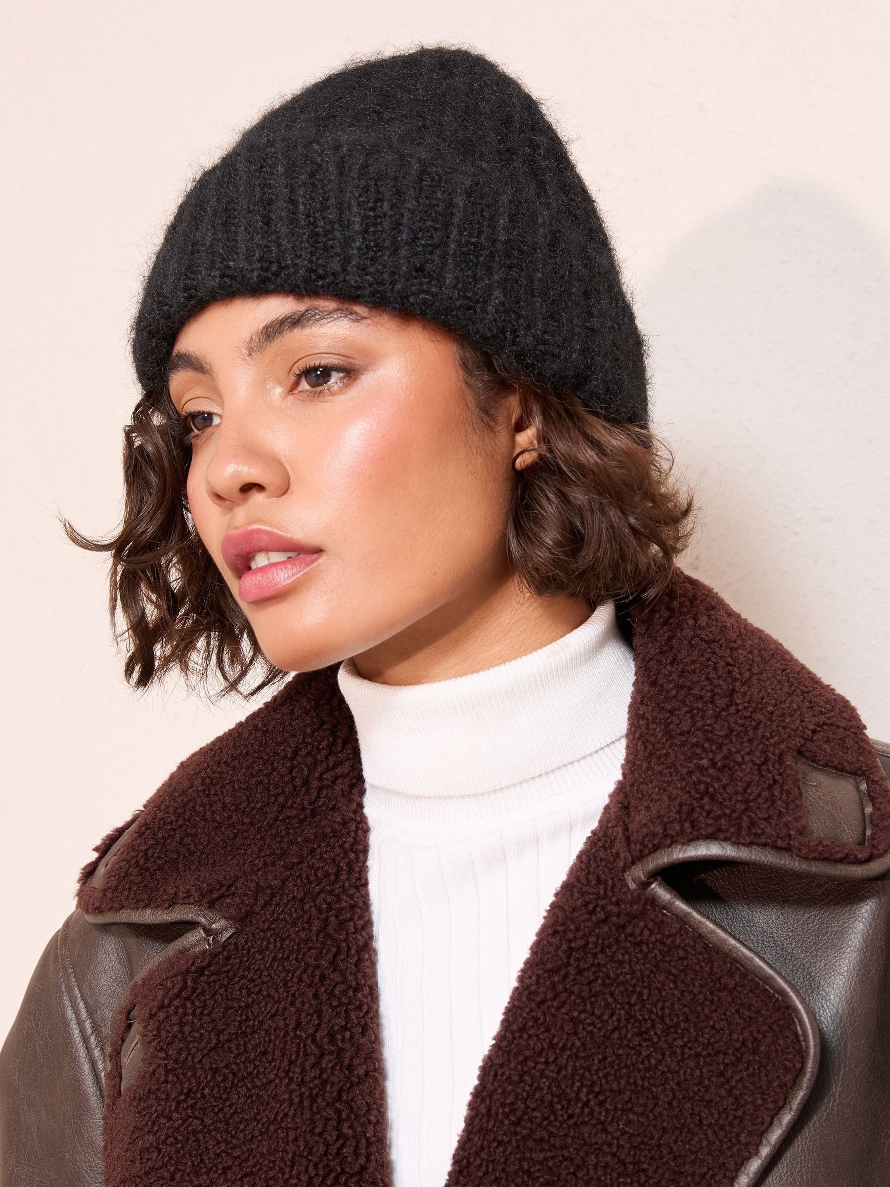 Buy Friends Like These Black Cosy Knitted Beanie Hat from the Next