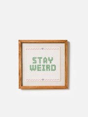 Oliver Bonas Natural Stay Weird Petit Point Framed Wall Art - Image 1 of 5