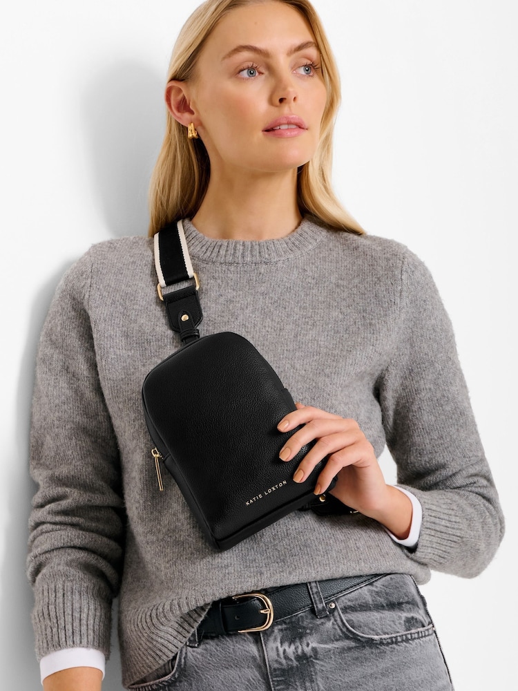 Katie Loxton Black Kaite Canvas Strap Sling Bag - Image 1 of 4 Katie Loxton Black Kaite Canvas Strap Sling Bag - Image 1 of 4