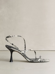 Schlangen-Print - Skinny – Signature-Premium-Schuhe aus Leder mit Riemchen und Absätzen - Bild 1 von 5