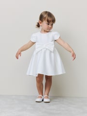 Ivory Girls Flower Bow Front Dress (3mths-10yrs) - Image 1 of 8
