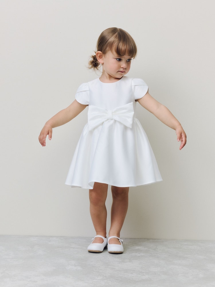 Ivory Girls Flower Bow Front Dress (3mths-10yrs) - Image 1 of 8