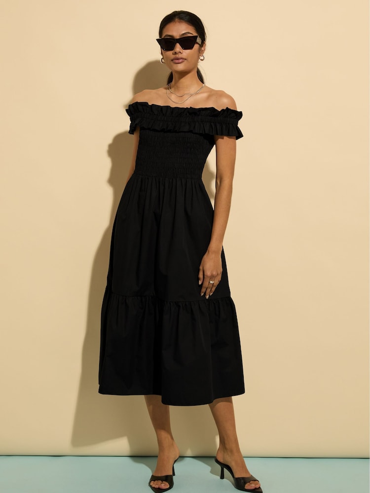 Baukjen Rafaella 100% Organic Cotton Off Shoulder Midi Black Dress - Bild 1 von 3 Baukjen Rafaella 100% Organic Cotton Off Shoulder Midi Black Dress - Bild 1 von 3