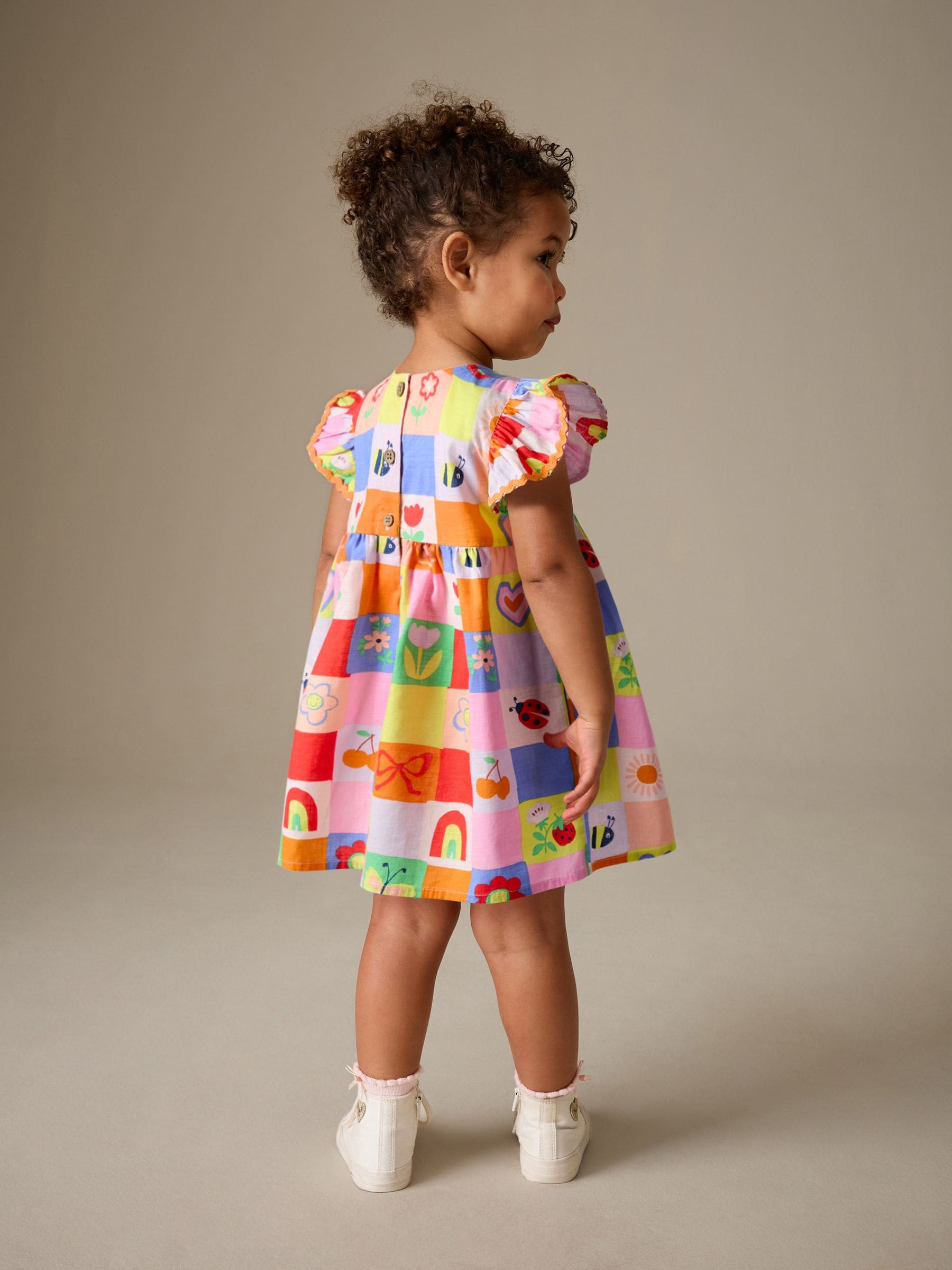 Buy Multi Character Ric Rac Frill Sleeve Dress (3mths-8yrs) from
